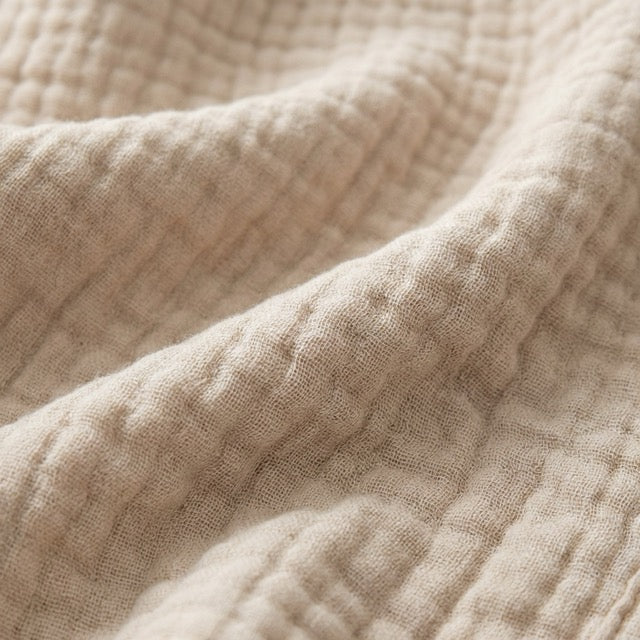 Gros plan sur le tissu gaufré de la mousseline